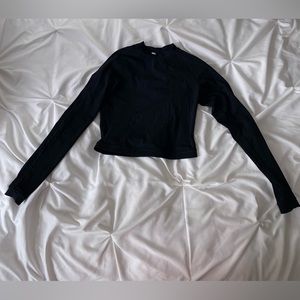 Black lululemon long sleeve swim shirt. Size 4